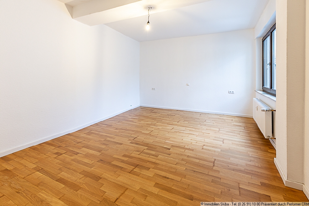 Erdgeschosswohnung in einem 2-Parteienhaus im verkehrsgünstig gelegenen Eifelörtchen Leimbach - Foto 4