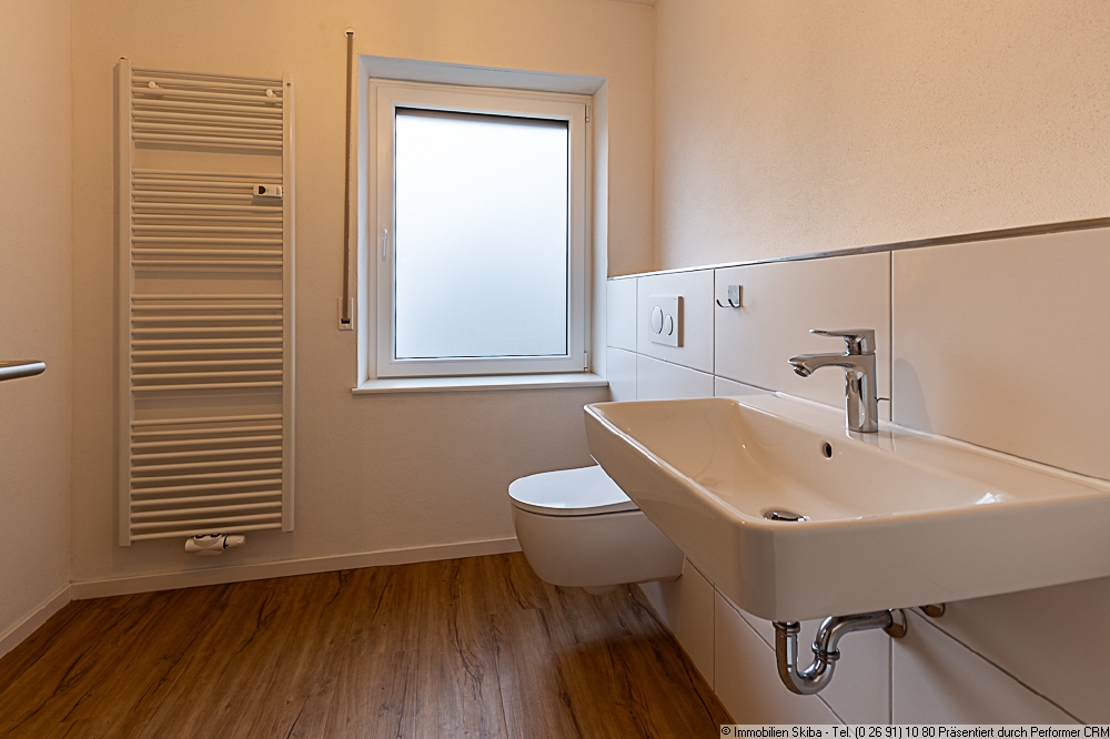 Erdgeschosswohnung in einem 2-Parteienhaus im verkehrsgünstig gelegenen Eifelörtchen Leimbach - Foto 1