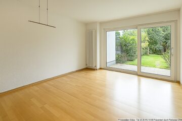 Gemütliches Reihenmittelhaus mit Garten in Lannesdorf - Wohnzimmer_KI