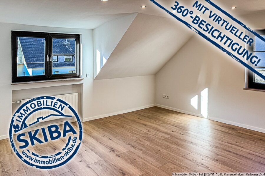 Erstbezug nach Sanierung: 3-Zimmer-Dachgeschoss-Wohnung in Herschbroich bei Adenau - Wohnzimmer Bild 1